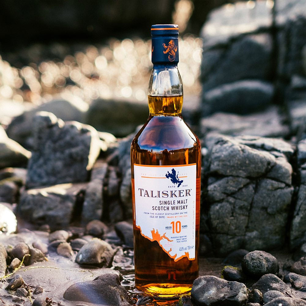 Talisker 10(45.8% abv) Year Old Scotch Whisky is a renowned single malt from the Isle of Skye, celebrated for its bold and distinctive character.
