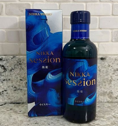 Nikka Session whisky bottle and packaging on a countertop with a tiled wall background price philippines