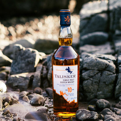 Talisker 10(45.8% abv) Year Old Scotch Whisky is a renowned single malt from the Isle of Skye, celebrated for its bold and distinctive character.