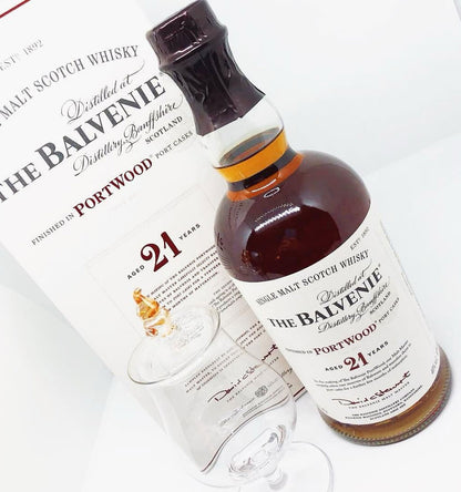 Balvenie Portwood 21-year-old whisky bottle with a glass on a white background - The Balvenie - 21 Year Old Portwood Single Malt Scotch Whisky 700ml Price Ph